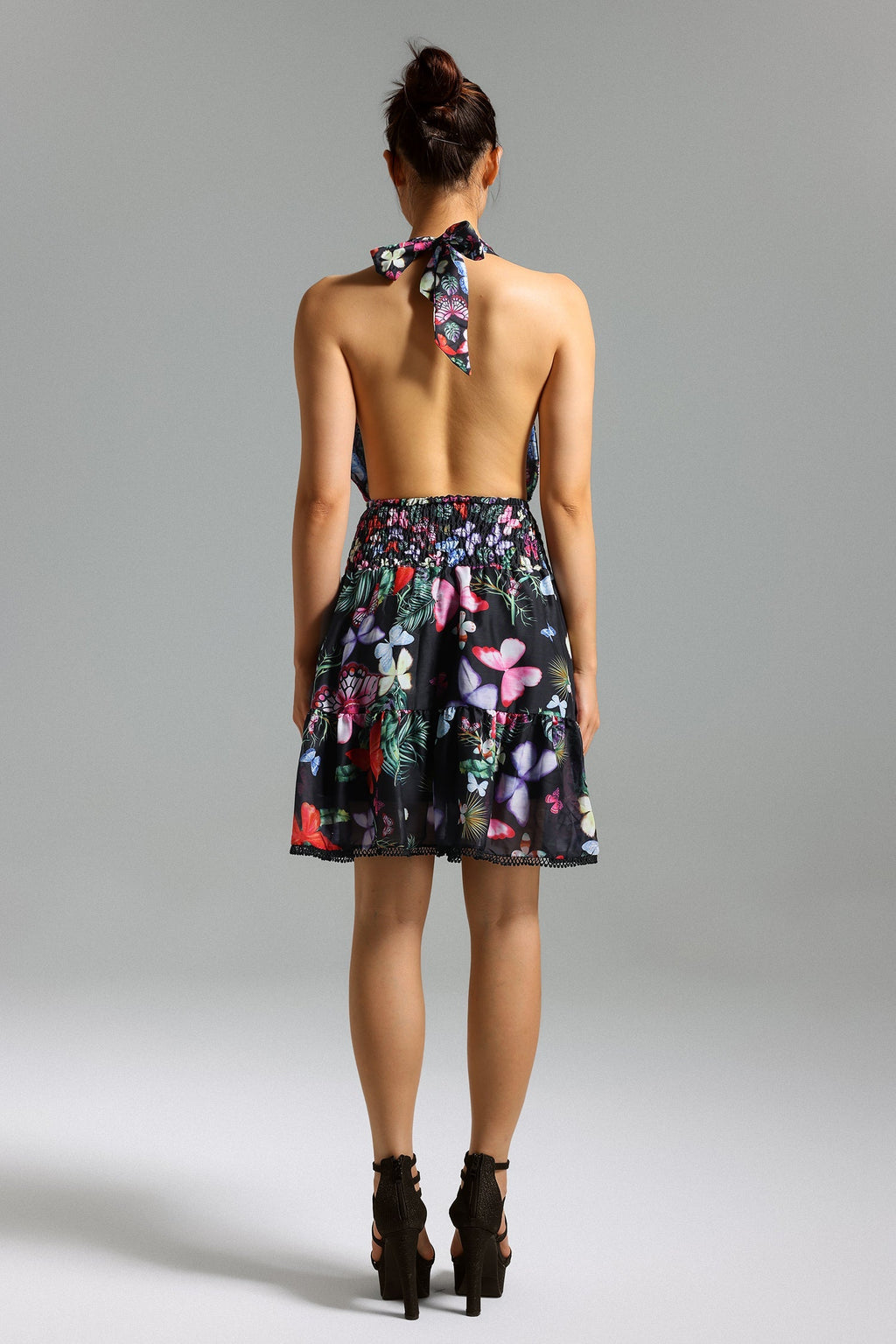 Tinsley Floral Mini Dress - Halter Neckline - Smocked Bodice - Flared Skirt - Vibrant Print