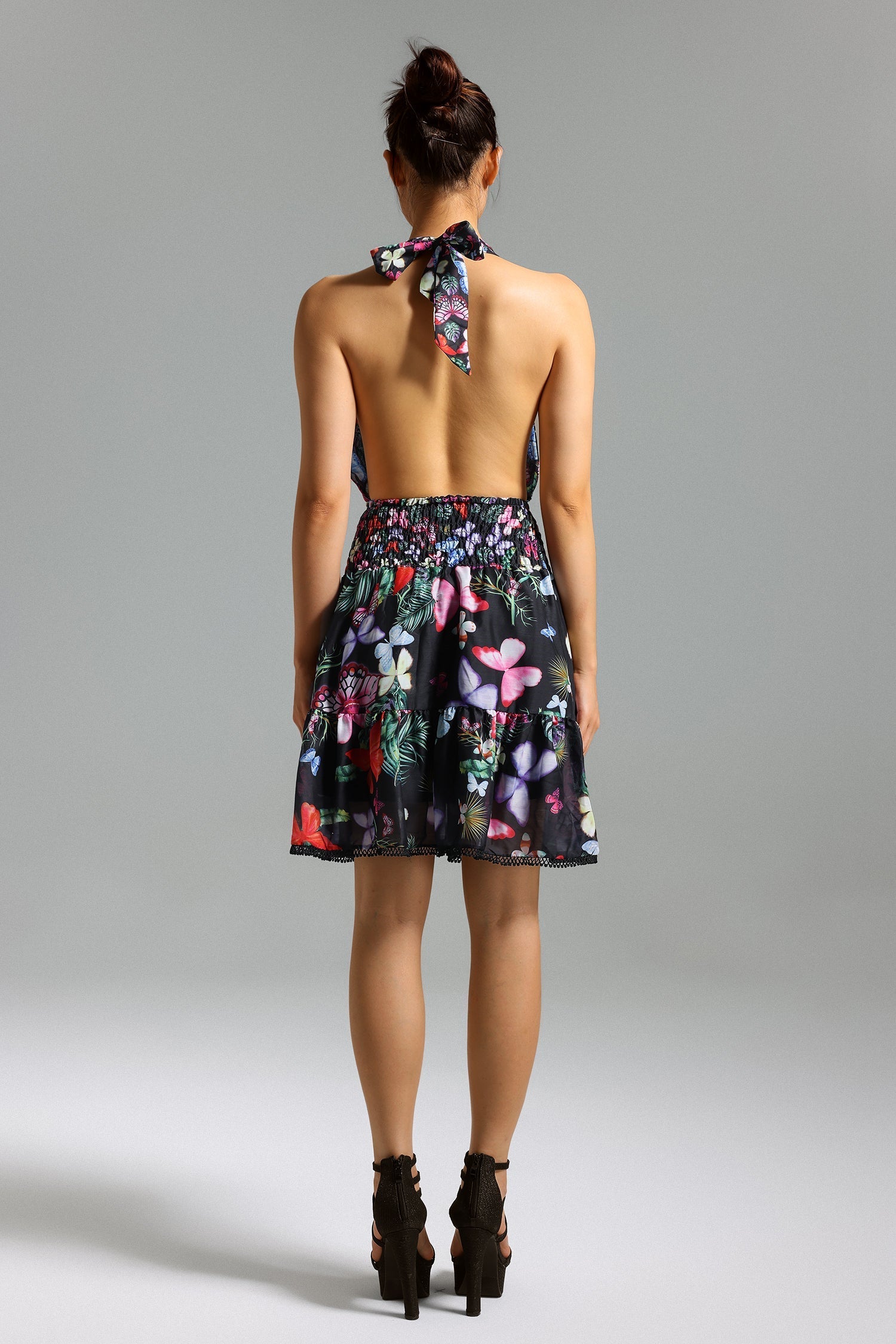 Tinsley Floral Mini Dress - Halter Neckline - Smocked Bodice - Flared Skirt - Vibrant Print