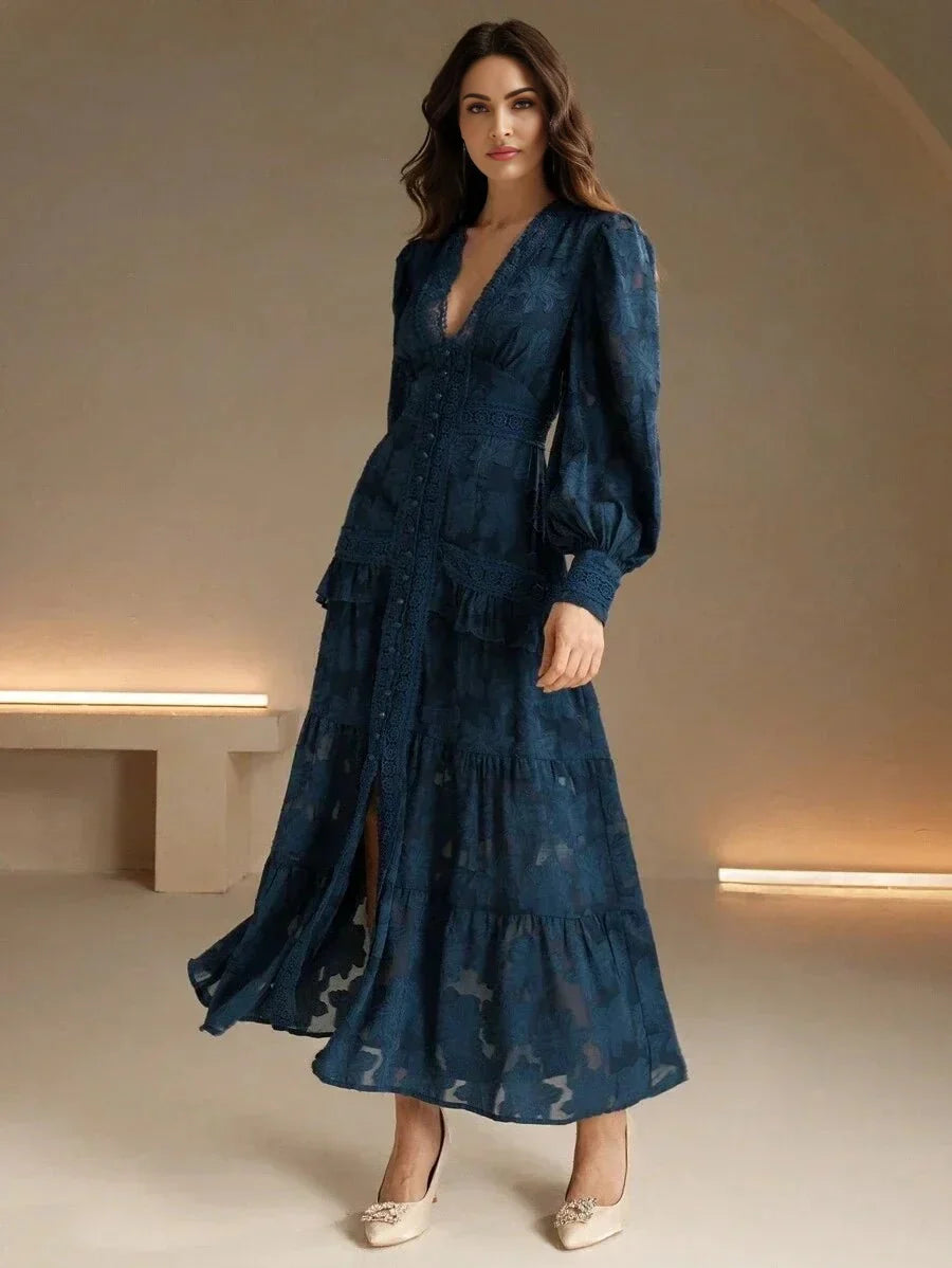 This stunning deep teal dress features a v-neckline and elegant long puff sleeves, perfect for a refined yet relaxed look..