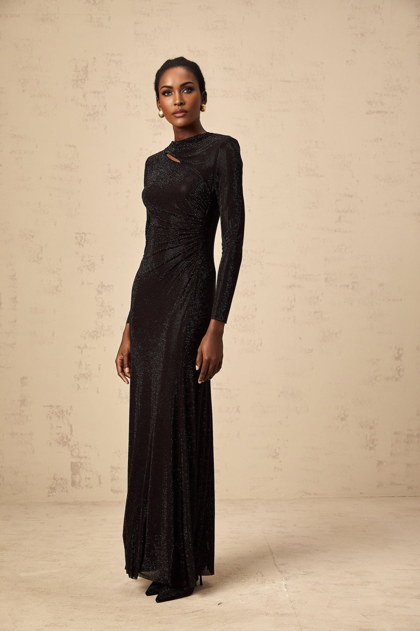 Angioletta Maxi Dress - Long Sleeves with Shoulder Pads - Ruched and Cut - Out Detailing - Rhinestone Embellishments with Concealed Rear Zip