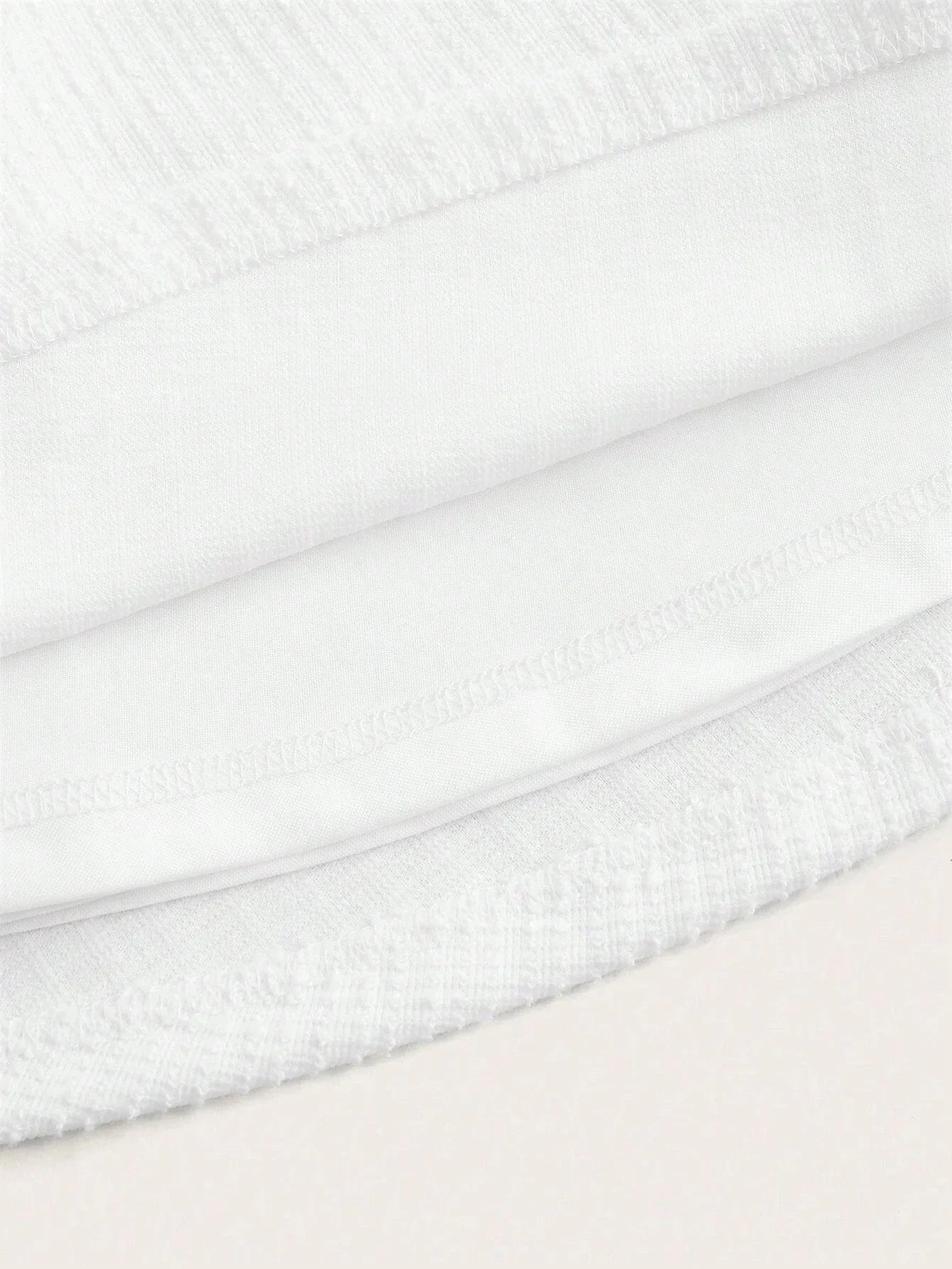This elegant white dress features a soft, breathable fabric with a subtle texture that provides a luxurious feel. Its fitted.