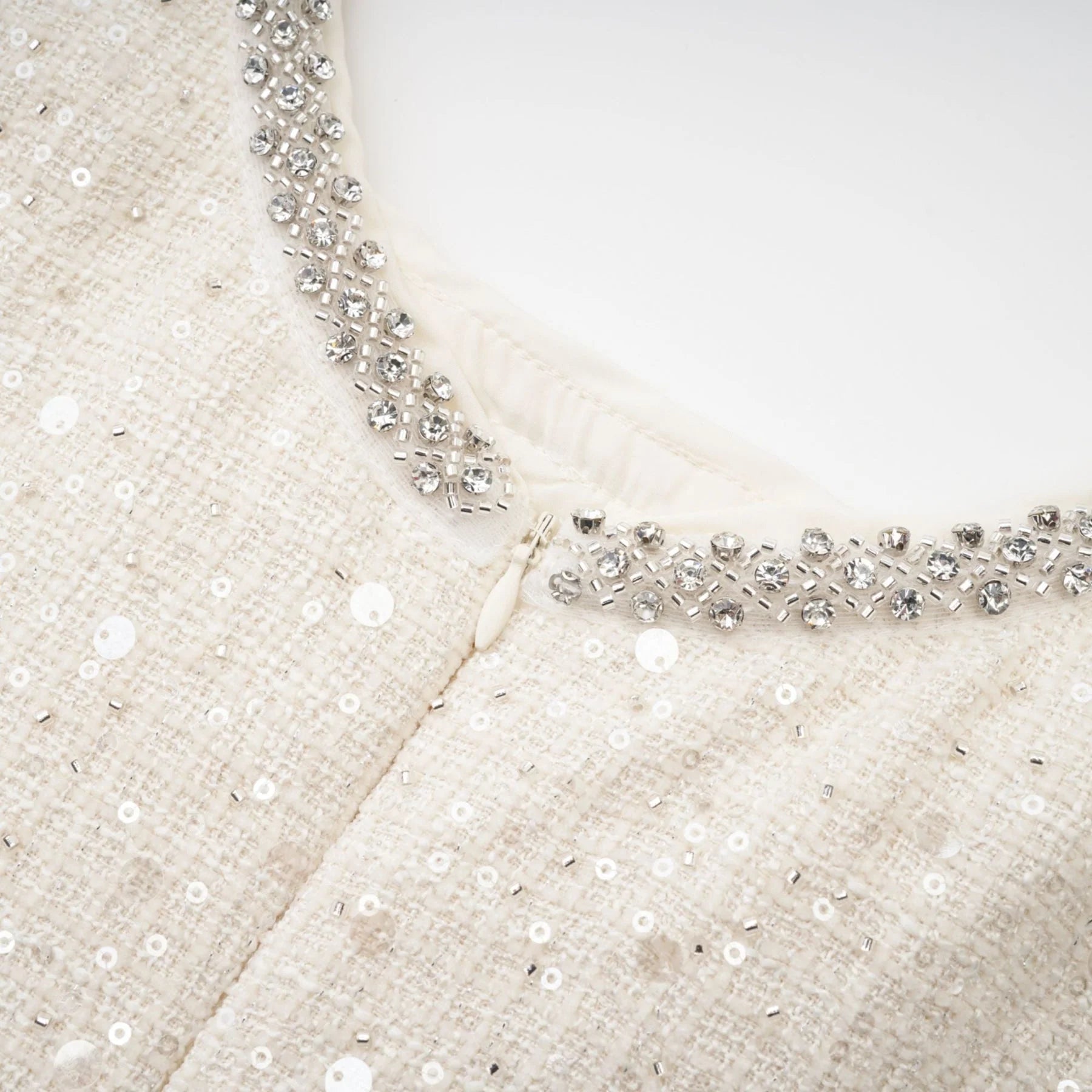 Brynn Mini Dress - Sleeveless with Sequin Detailing - Cut - Out Design - Crystal Embellishments - Bow Accent