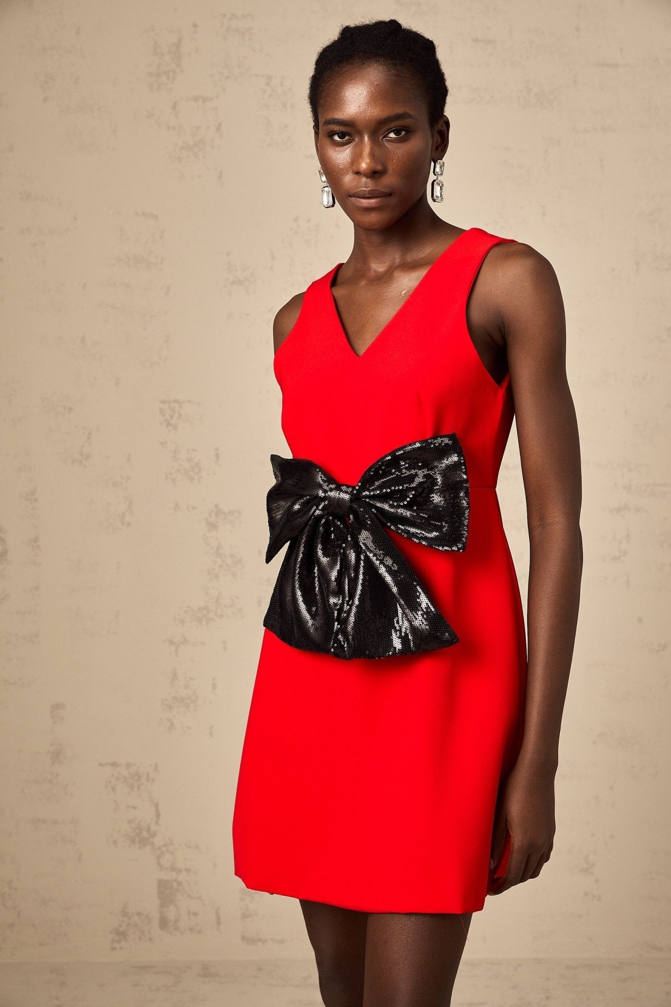 Celeste Sequin Mini Dress - Sleeveless V - Neckline with Bow Detailing - Wide Shoulder Straps and Side Slip Pockets - Thigh - Length Cut
