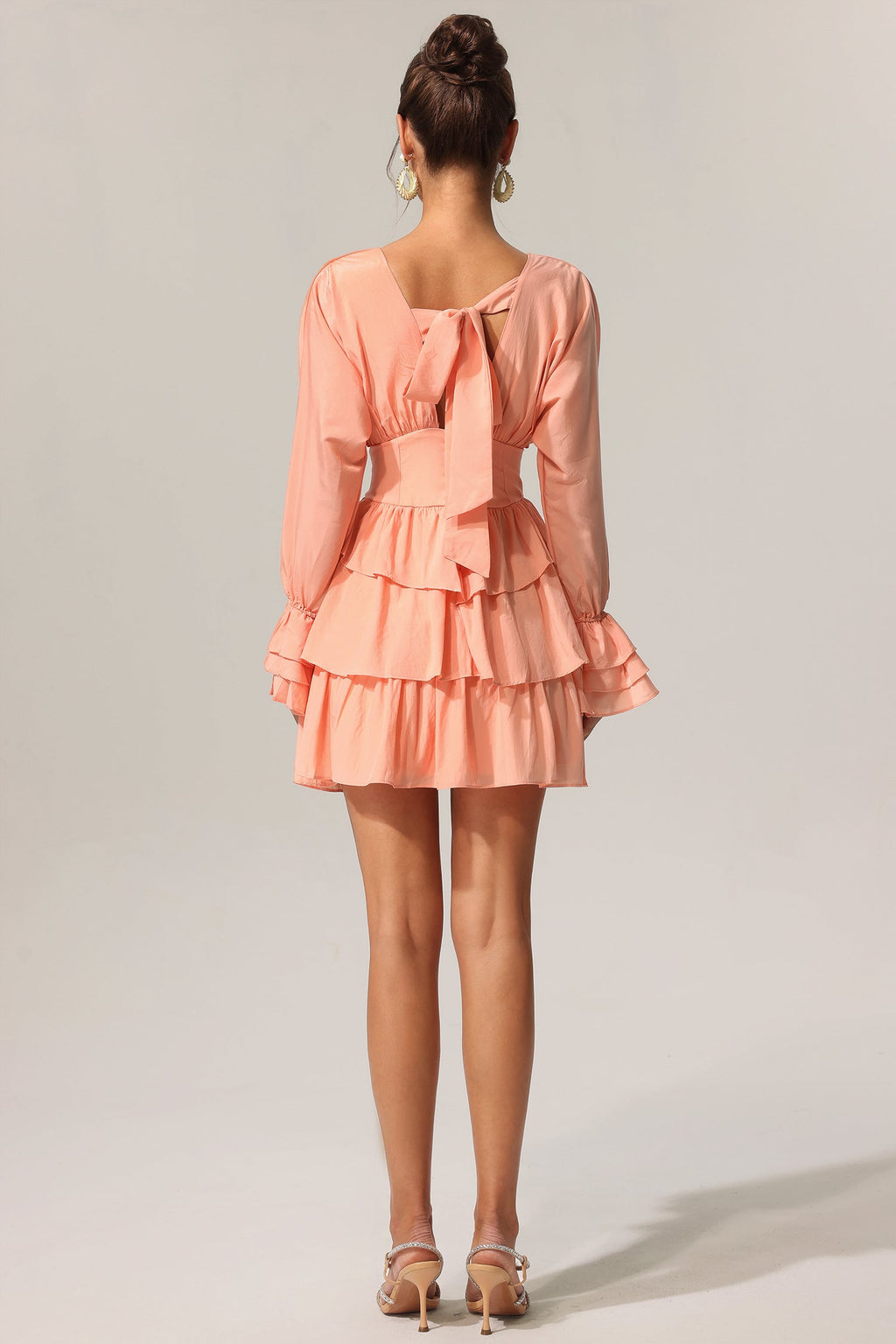Charlotte Peach Flowing Silhouette V-Neckline Layered Folds Flared Sleeves Cinched Waist Dress