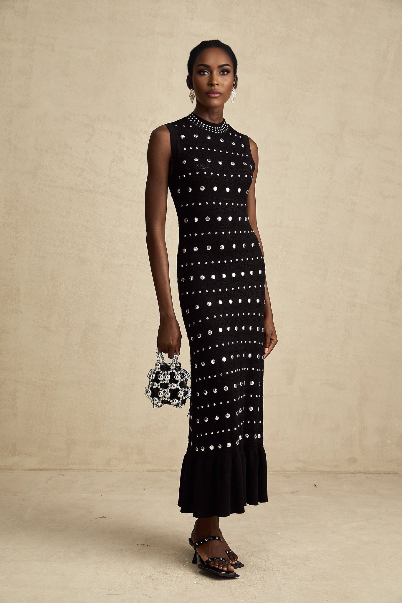 Cinzietta Maxi Dress - Crochet Knit - Crew Neck Style - Stud Embellishments - Ruffled Hem