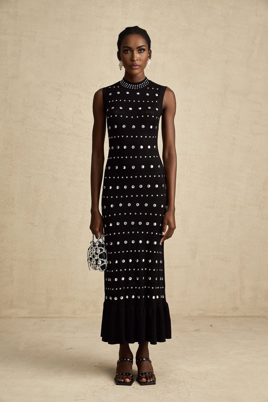 Cinzietta Maxi Dress - Crochet Knit - Crew Neck Style - Stud Embellishments - Ruffled Hem