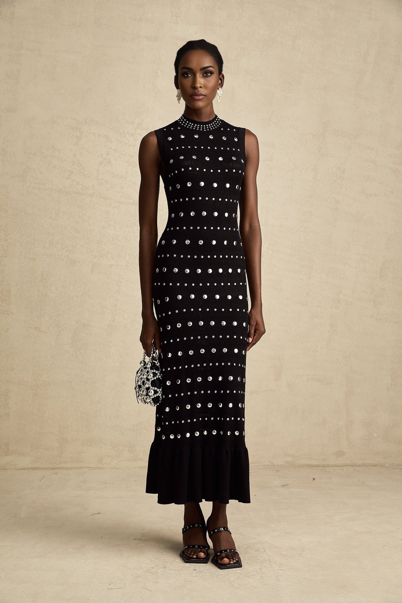 Cinzietta Maxi Dress - Crochet Knit - Crew Neck Style - Stud Embellishments - Ruffled Hem