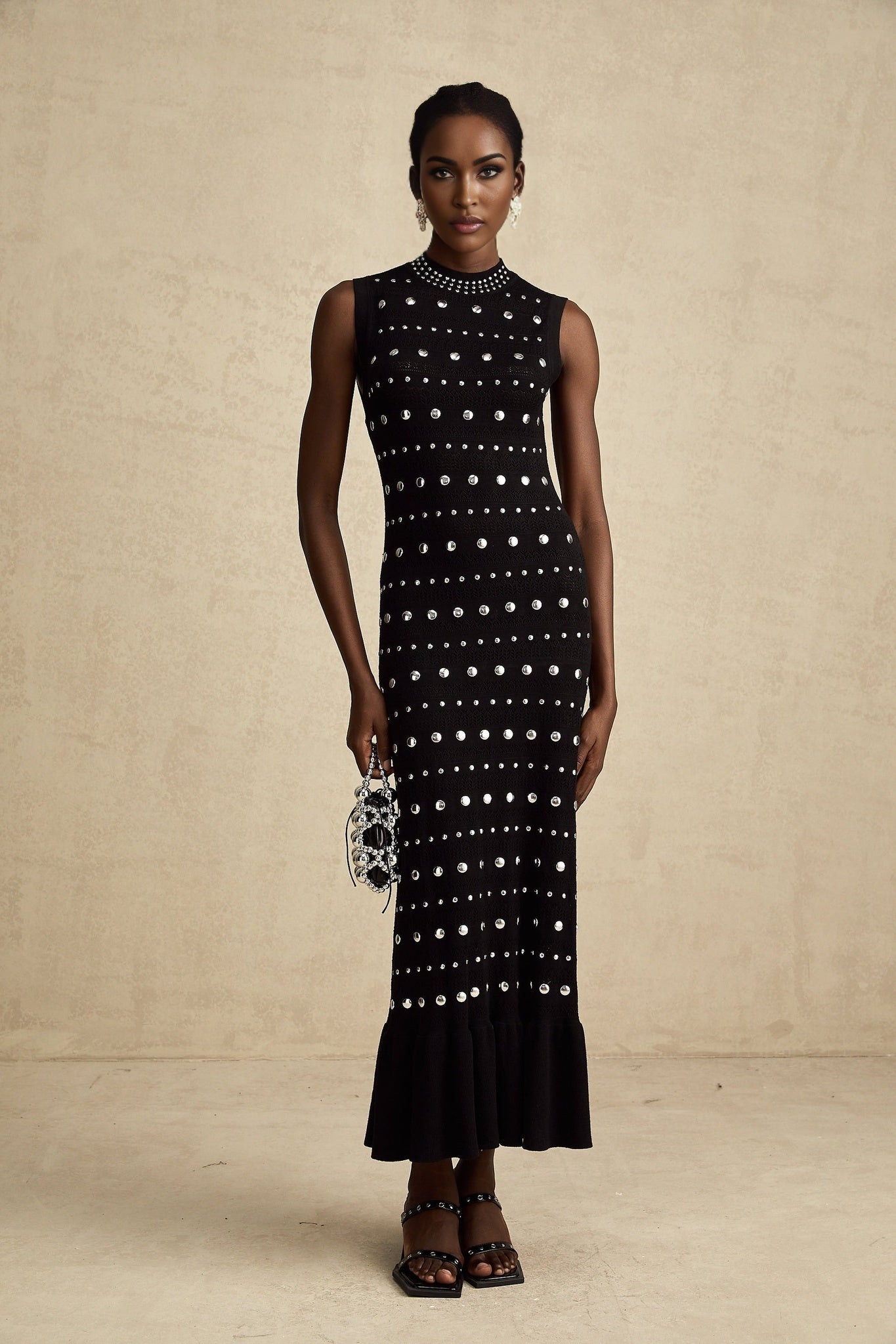 Cinzietta Maxi Dress - Crochet Knit - Crew Neck Style - Stud Embellishments - Ruffled Hem