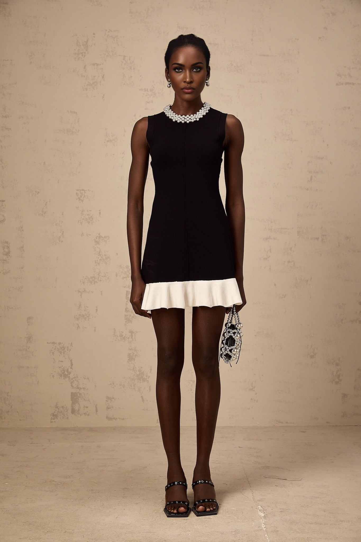 Concetta Mini Dress - Sleeveless Style - Knitted Construction - Ruffled Detailing - Contrast Colors - Faux - Pearl Embellishment