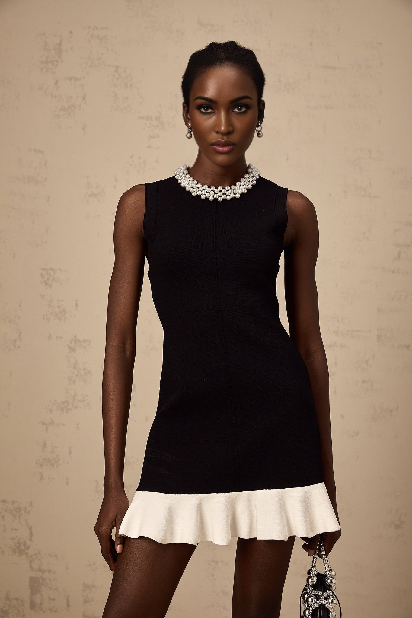 Concetta Mini Dress - Sleeveless Style - Knitted Construction - Ruffled Detailing - Contrast Colors - Faux - Pearl Embellishment