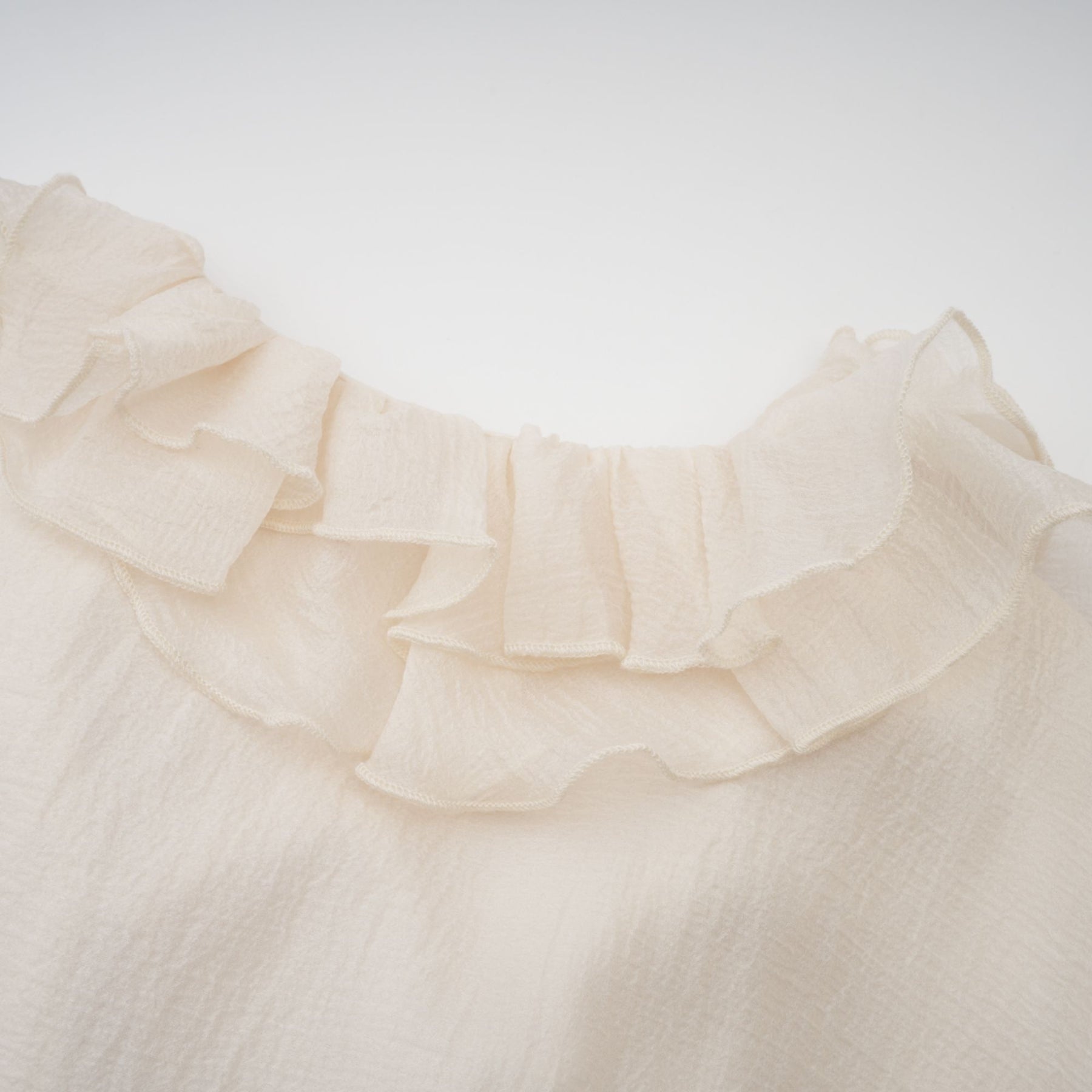 Debora Mini Dress – V - neck – Floral Appliqué – Ruffled Detailing