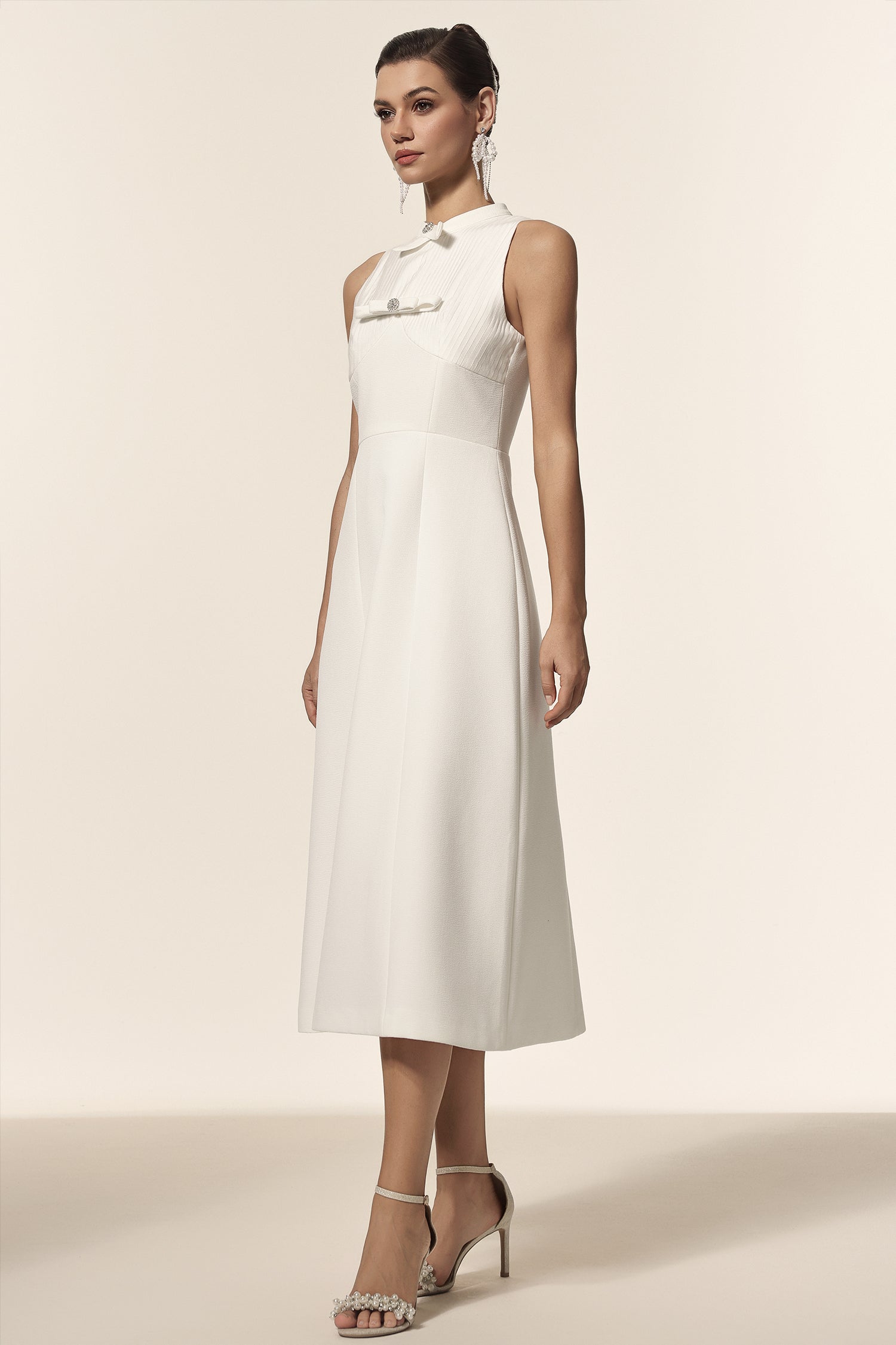 Delia White Midi Dress with Bowknot Detailing and Elegant Silhouette for Formal Events and Casual Outings