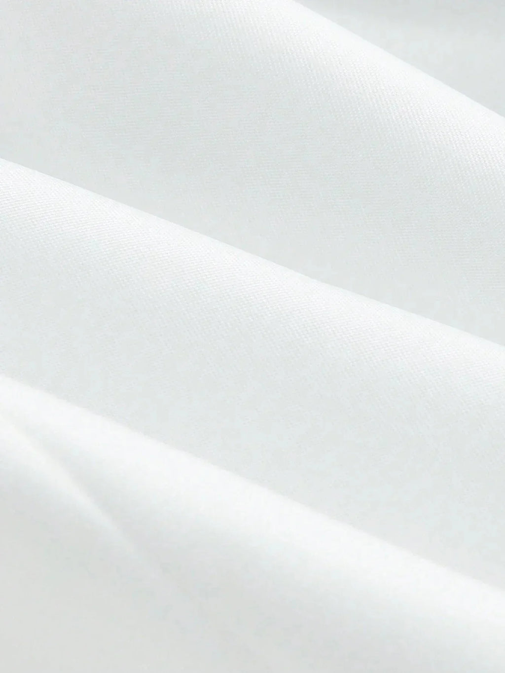Elegant and versatile, this pristine white dress features a flattering, tailored fit that gracefully hugs the body while.