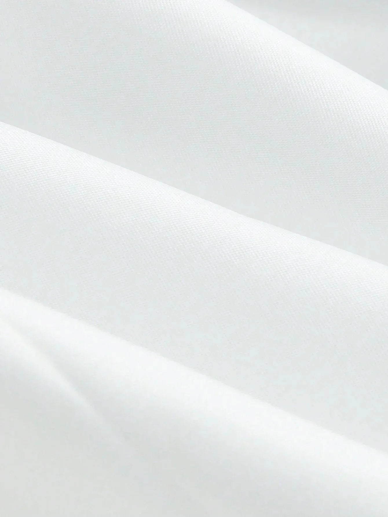 Elegant and versatile, this pristine white dress features a flattering, tailored fit that gracefully hugs the body while.