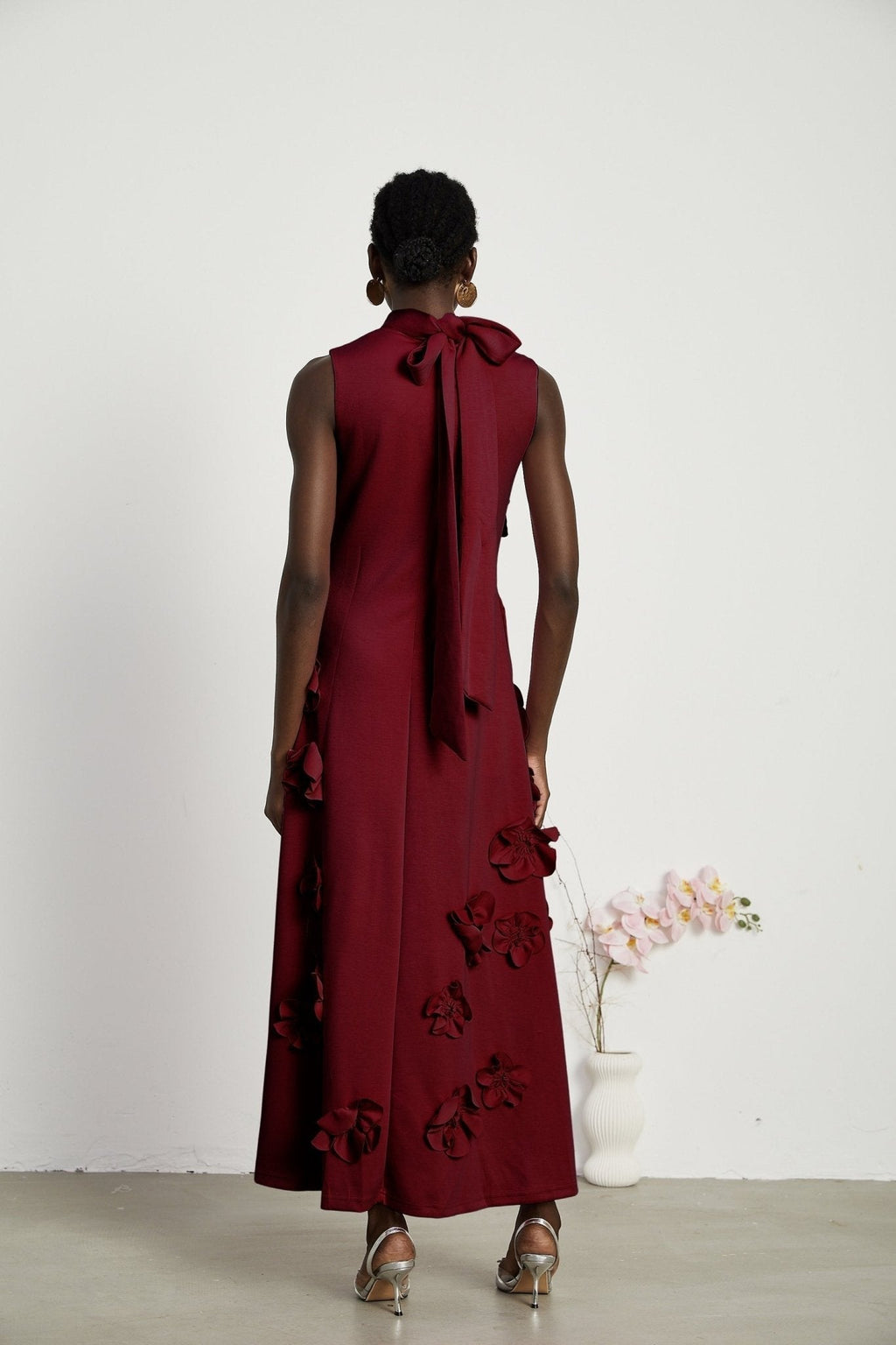 Elisa Maxi Dress - Sleeveless Style - Faux Flower Embellishments - Bow Tie Neck Detail - Flounce Hem