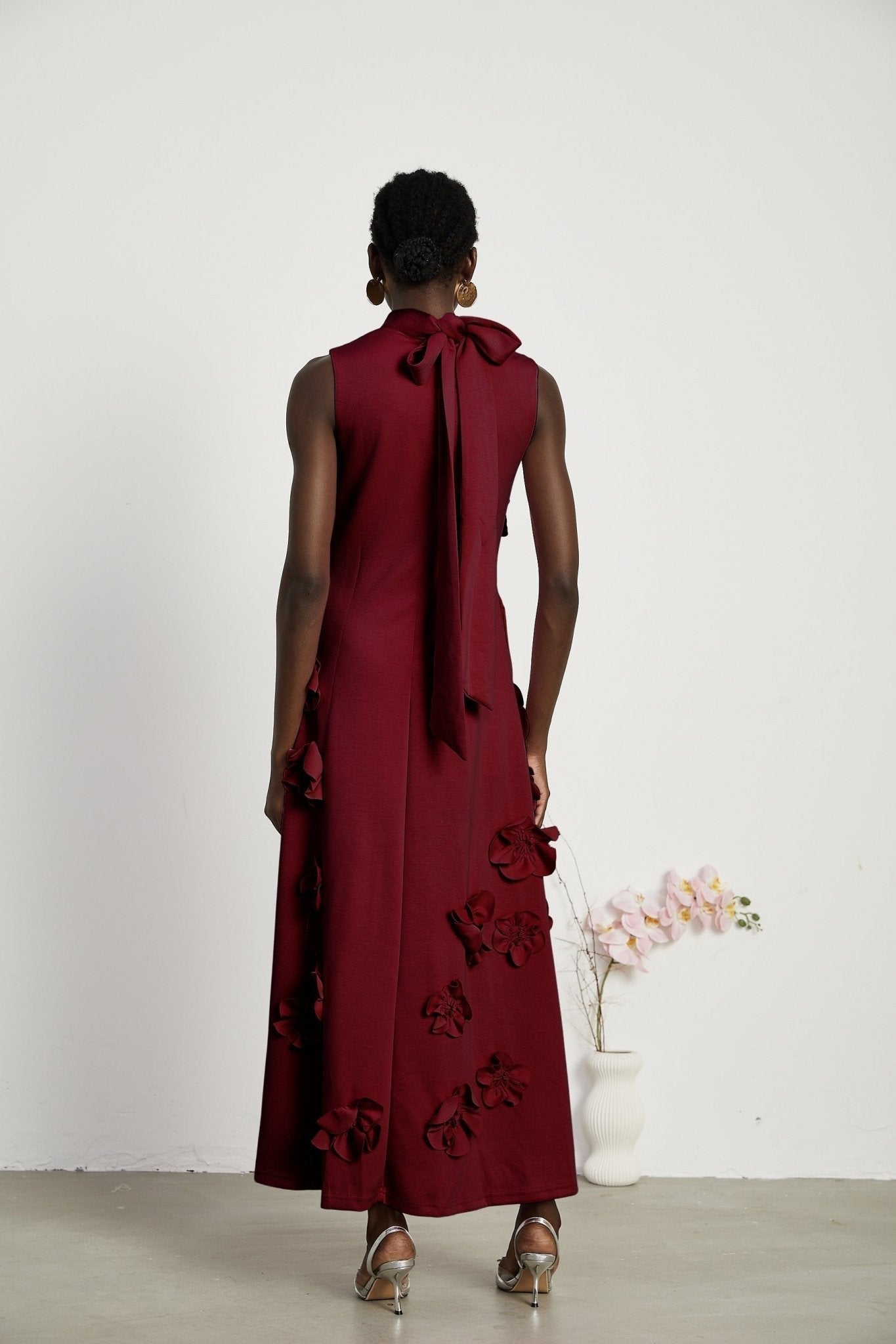 Elisa Maxi Dress - Sleeveless Style - Faux Flower Embellishments - Bow Tie Neck Detail - Flounce Hem