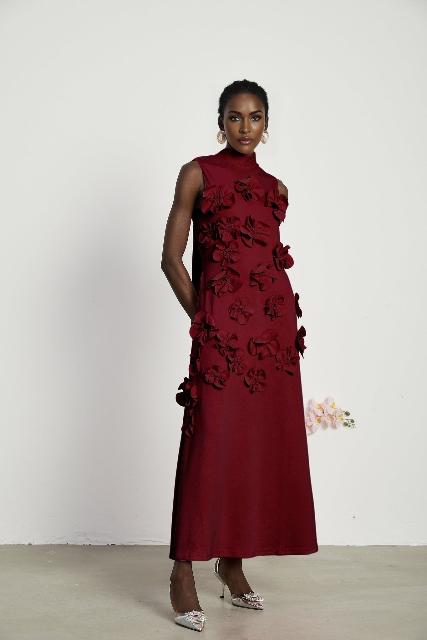 Elisa Maxi Dress - Sleeveless Style - Faux Flower Embellishments - Bow Tie Neck Detail - Flounce Hem