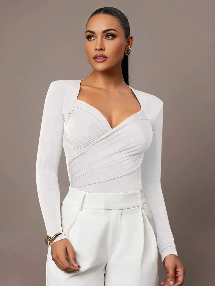 Gianna Bodysuit - Slim Fit - Knitted Fabric (93% Polyester, 7% Elastane) - Natural Waist Line (mid Waist) - Regular Long Sleeves - Modern Look