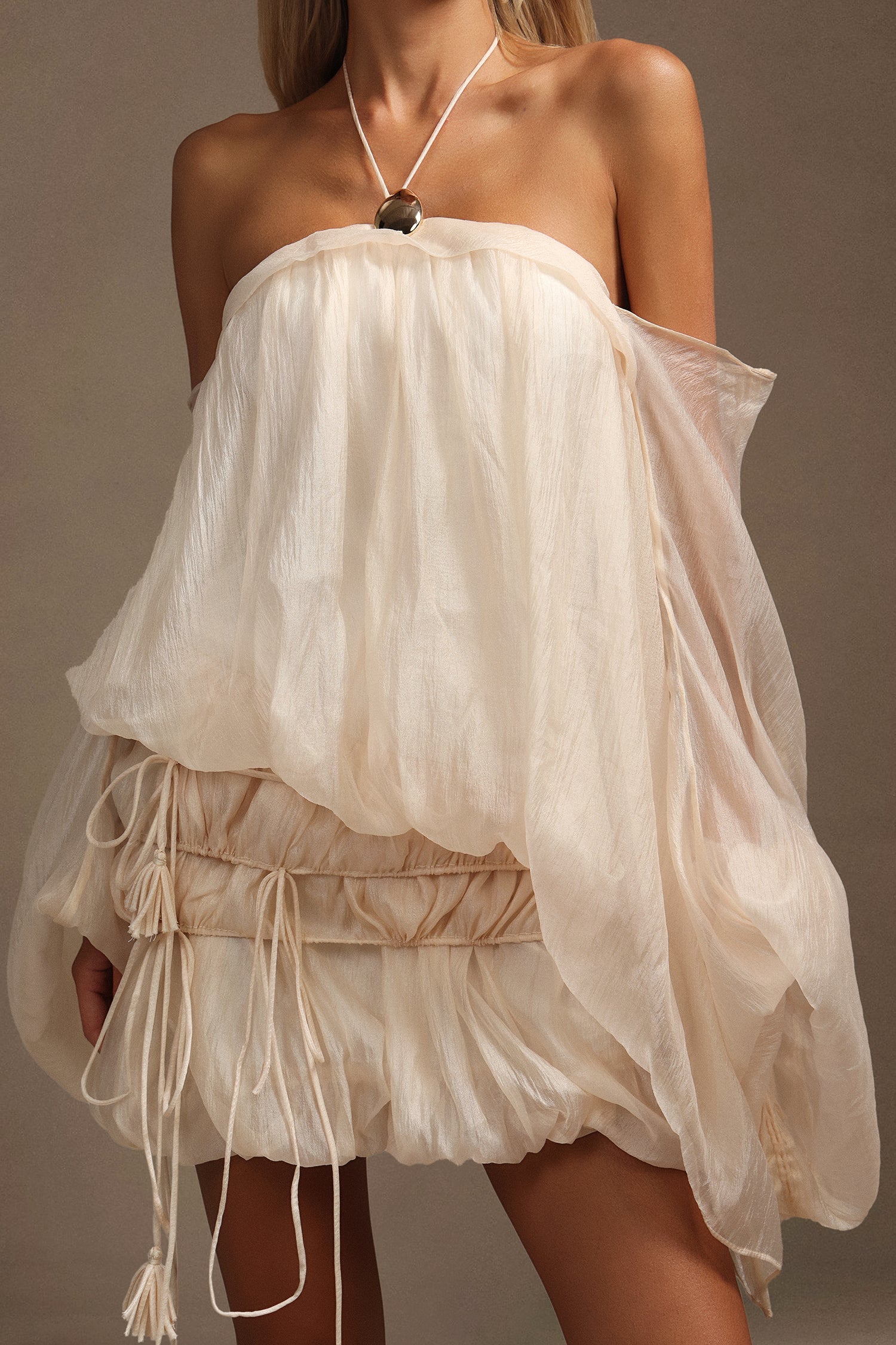 Hanna Beige Mini Dress Elegance Modernity Statement Event Unique Silhouette Lightweight Fabric Waist Detailing Summer Parties Weddings Evenings Charm Style Versatile Heels Sandals Wardrobe