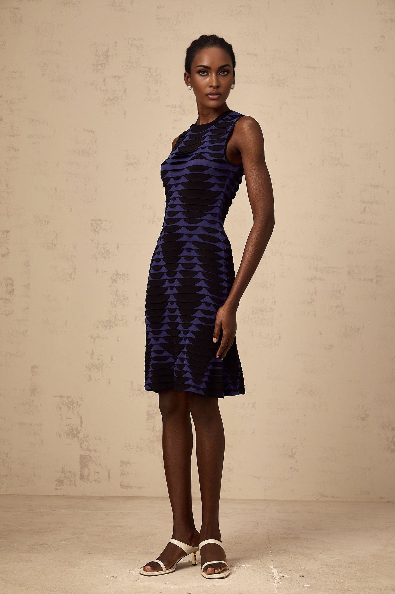 Helena Mini Dress - Stretch Knit - Sleeveless - 3D Snake Pattern - Flared Hem - Godet Design