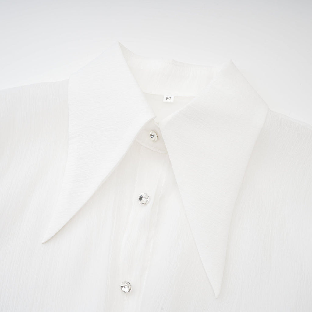 Jayla White Ruffled Blouse With Pointed Collar And Embellished Buttons