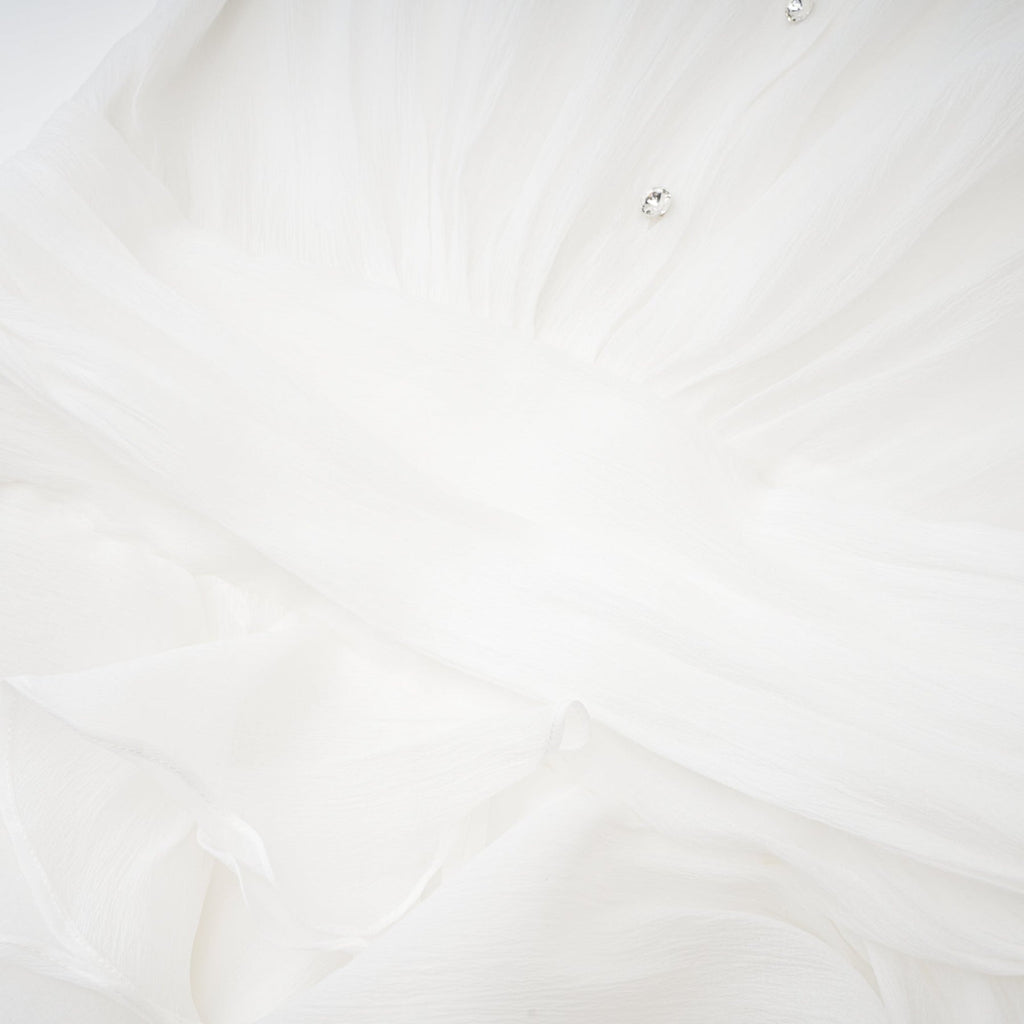 Jayla White Ruffled Blouse With Pointed Collar And Embellished Buttons