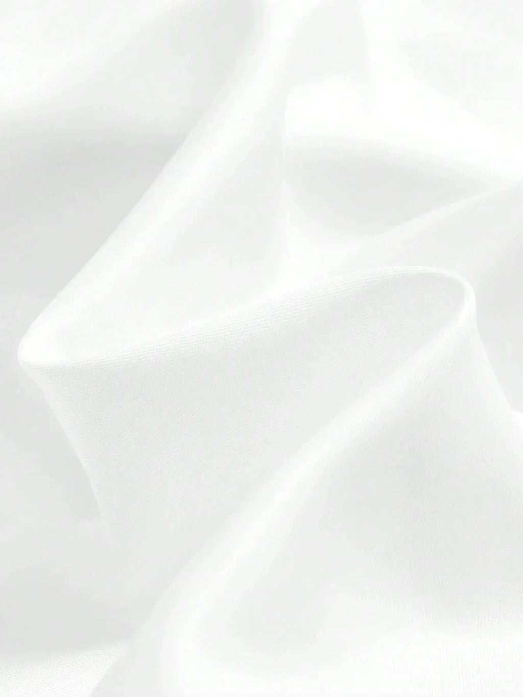 Experience effortless elegance with this flowing white dress, crafted from soft, breathable fabric that drapes beautifully.