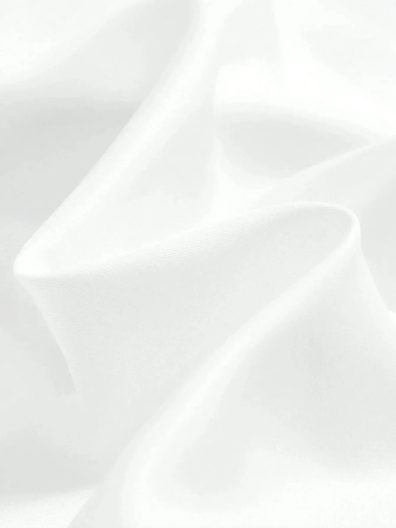 Experience effortless elegance with this flowing white dress, crafted from soft, breathable fabric that drapes beautifully.