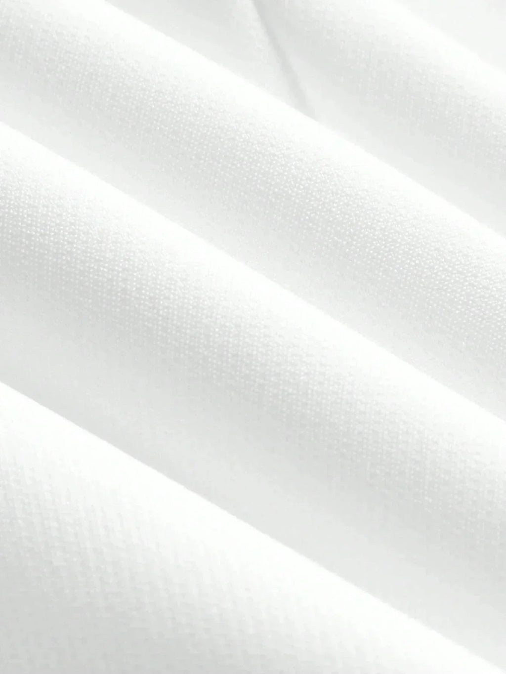 Soft and lightweight white fabric showcases a refined texture with a subtle sheen, perfect for a fresh, elegant dress. This.