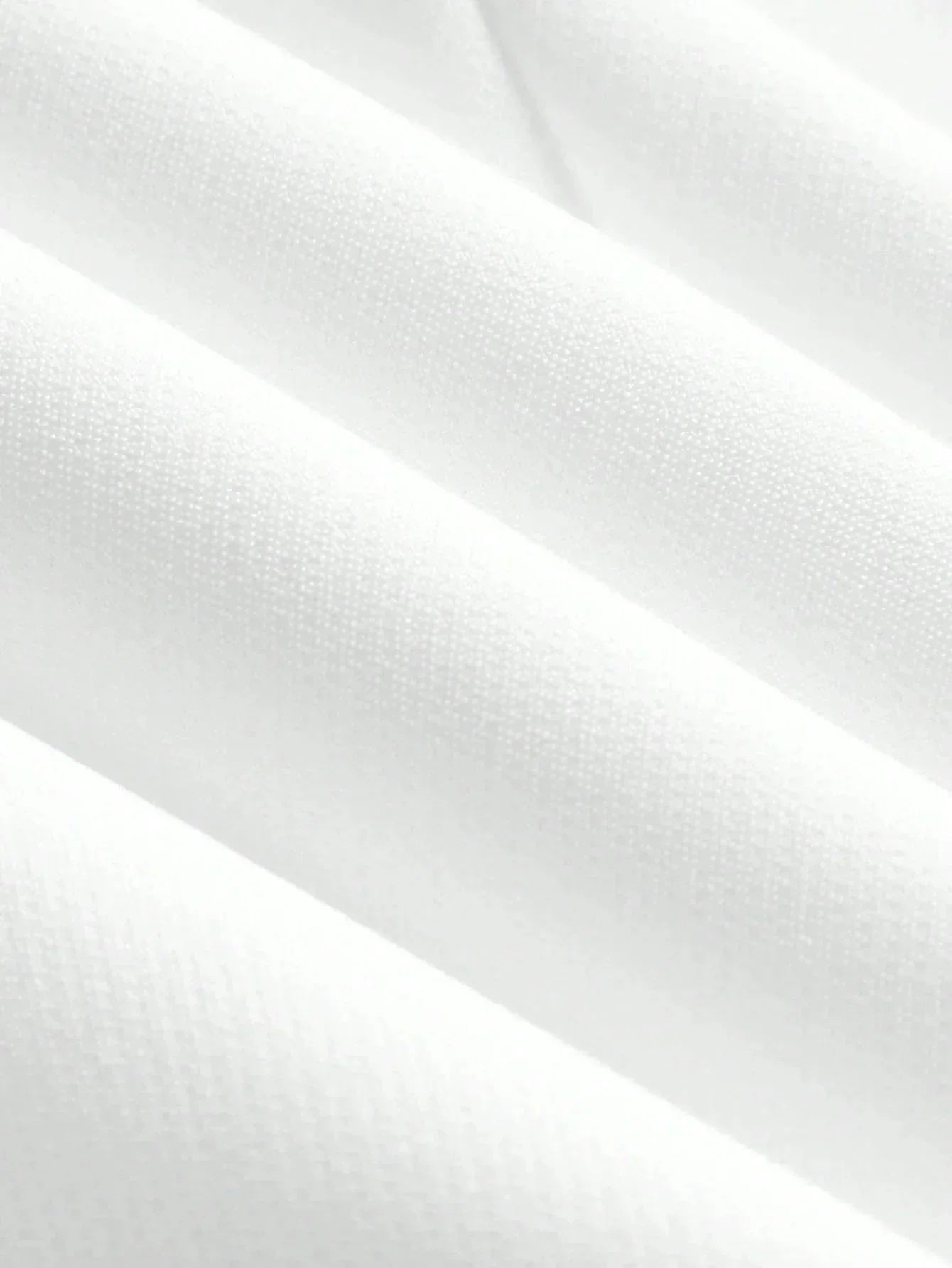 Soft and lightweight white fabric showcases a refined texture with a subtle sheen, perfect for a fresh, elegant dress. This.