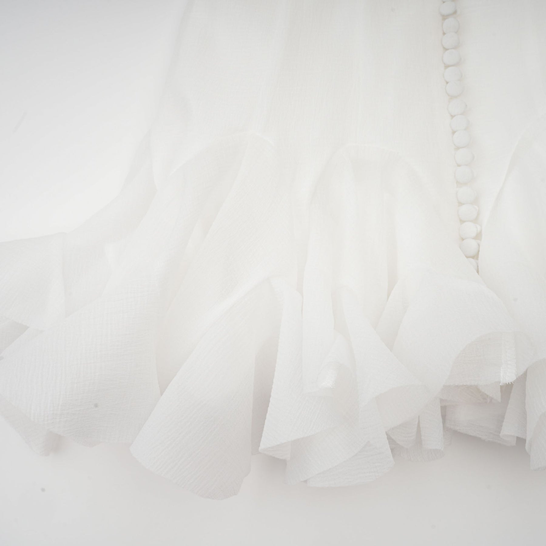 Letizia Mini Dress White Flared Sleeves Sheer Button Hem