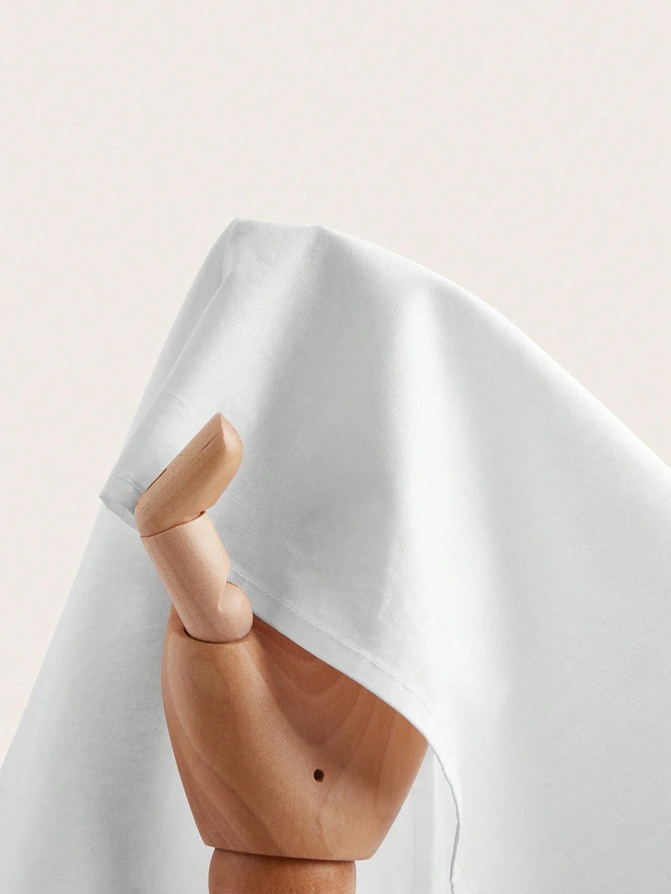 Crafted from soft, breathable fabric, this elegant white dress features a flowing silhouette that drapes beautifully for a.