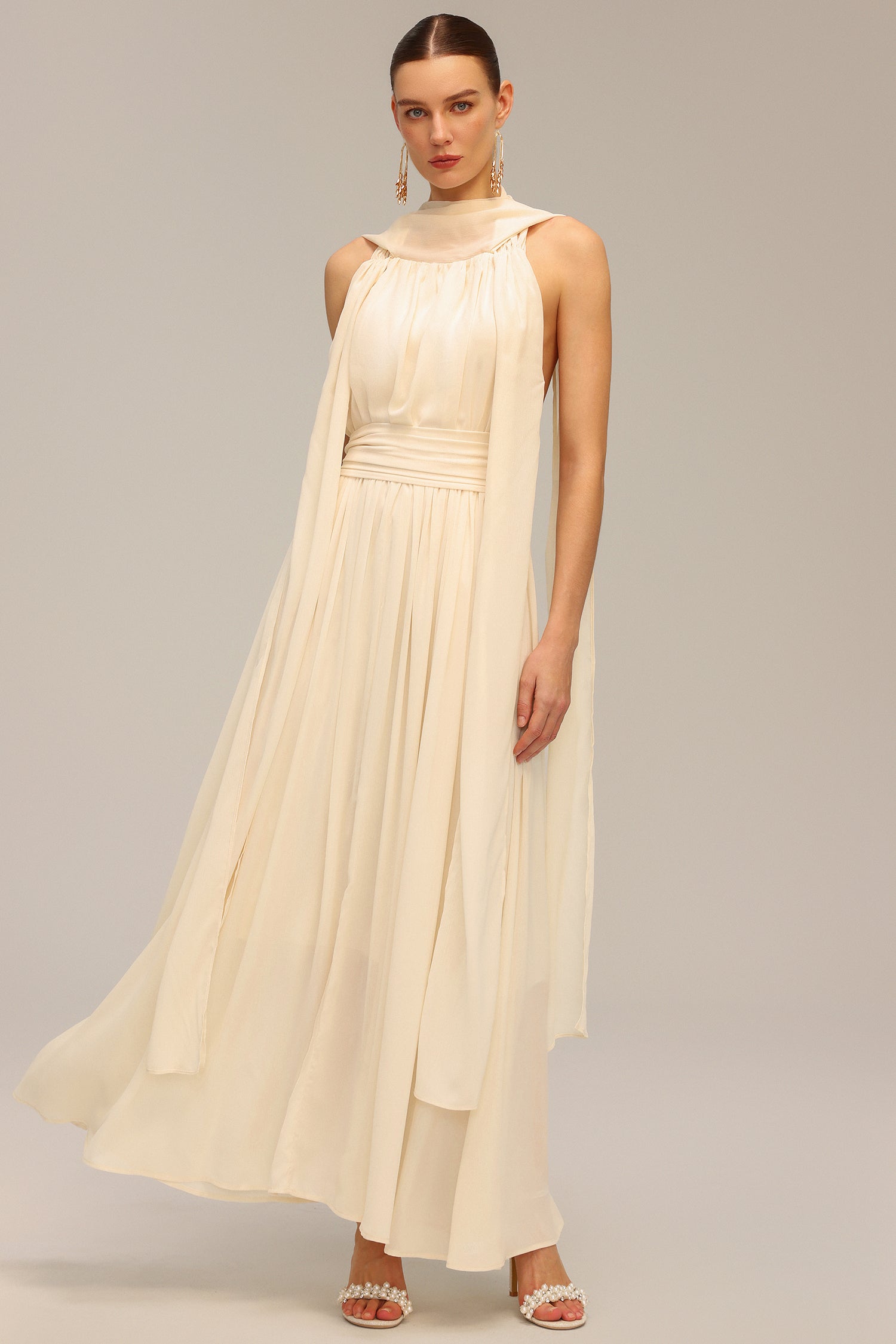 Lily Beige Backless Sleeveless Draped Neckline Dress with Folds and Streamer Accents for Special Occasions