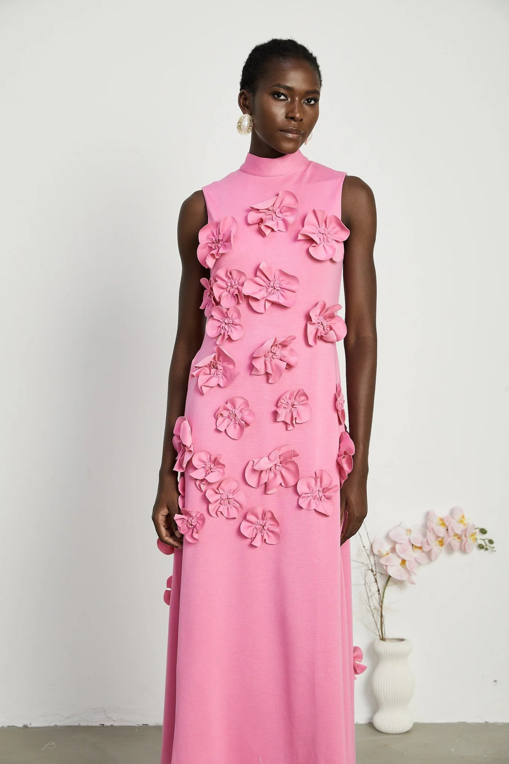 Lola Pink Maxi Dress with Faux - Flower Detail, Bow Neckline and Flounce Hem