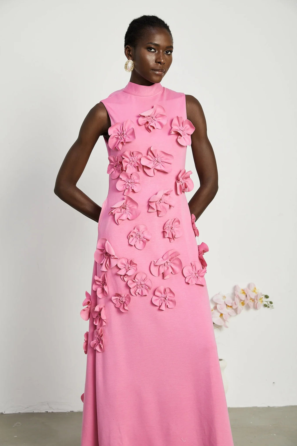 Lola Pink Maxi Dress with Faux - Flower Detail, Bow Neckline and Flounce Hem
