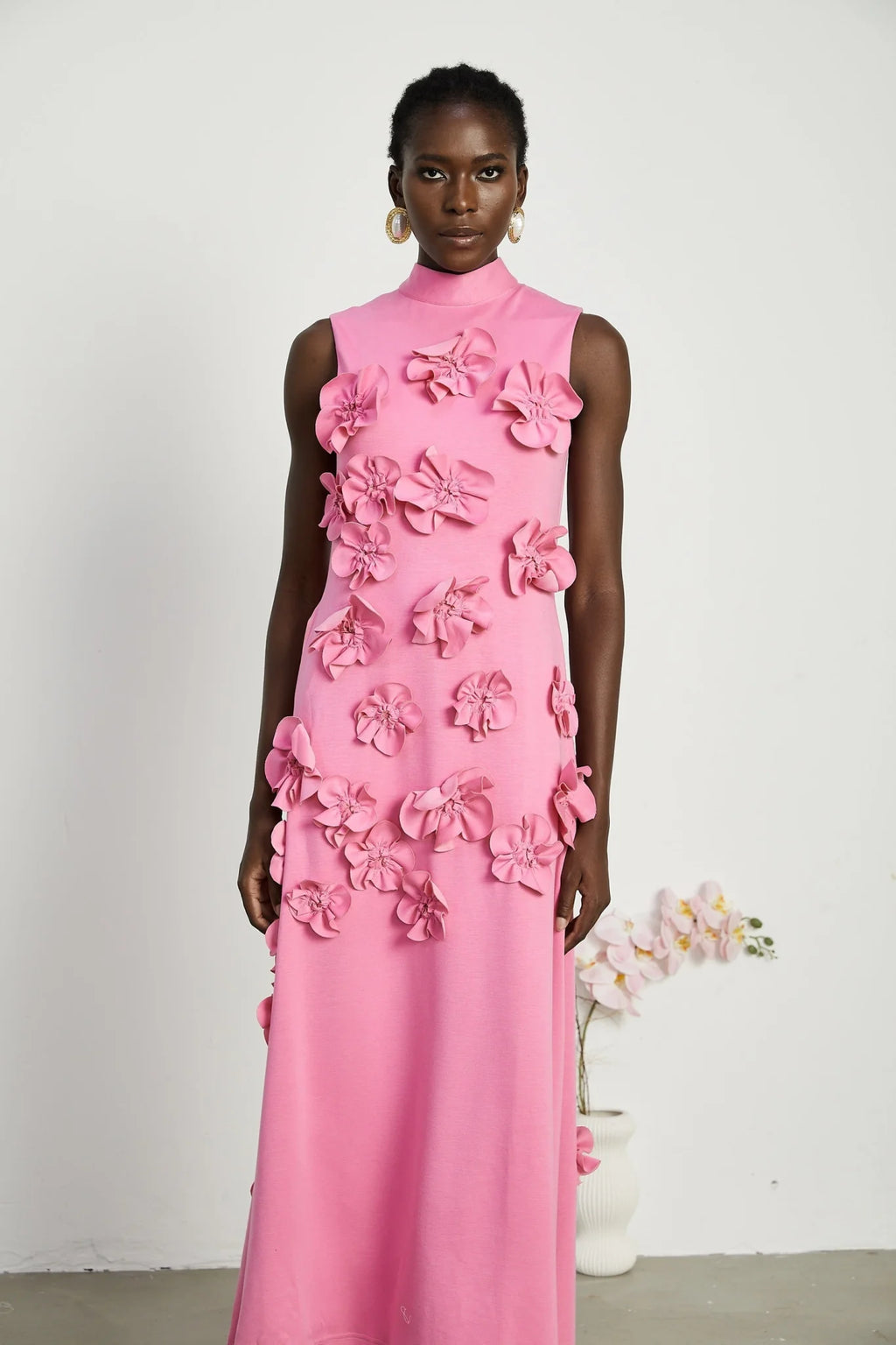 Lola Pink Maxi Dress with Faux - Flower Detail, Bow Neckline and Flounce Hem