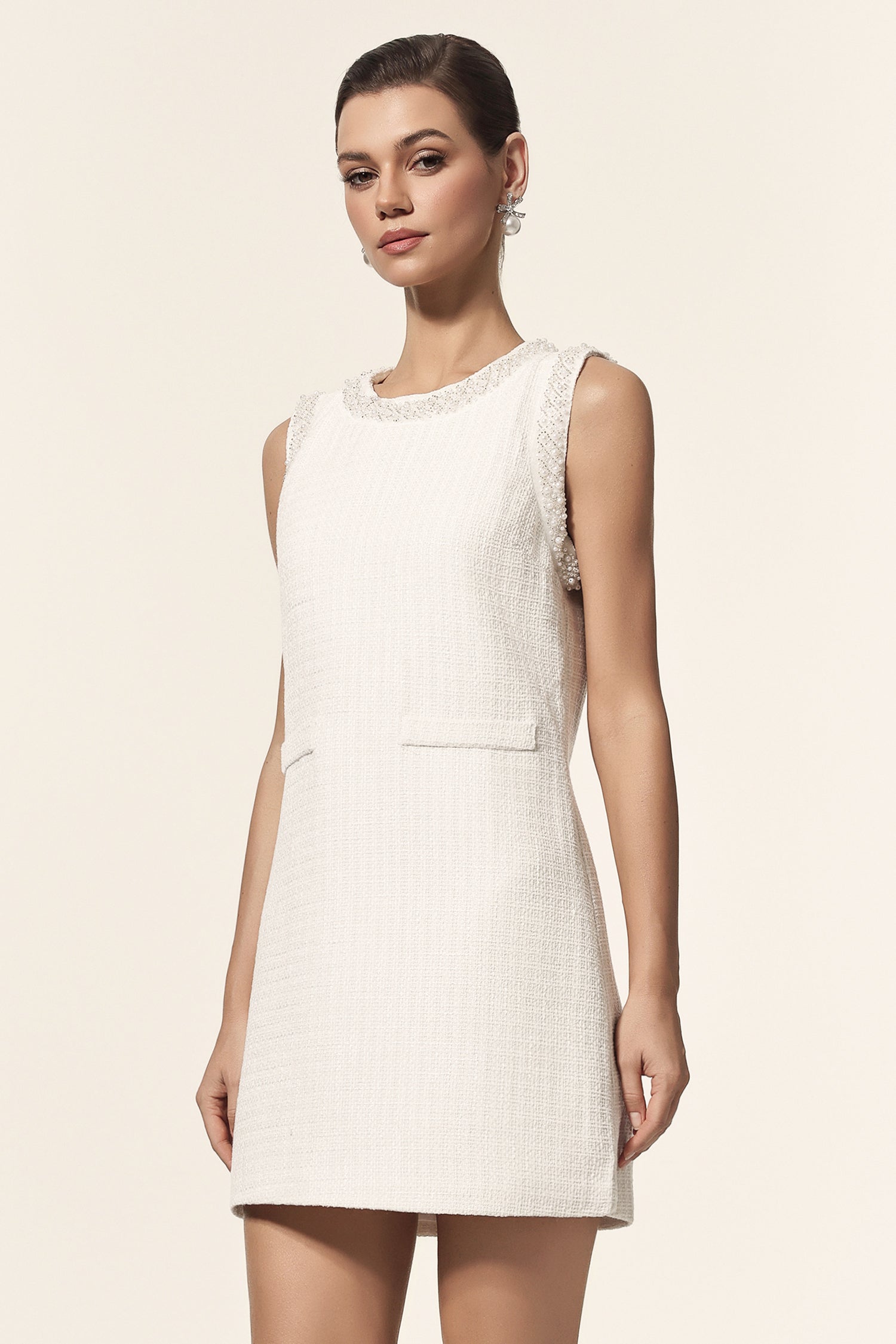 Lucrezia White Textured Sleeveless Mini Dress with Elegant Detailing