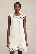 Luigia White Lace Sleeveless Mini Dress with Floral Patterns and Playful Hemline