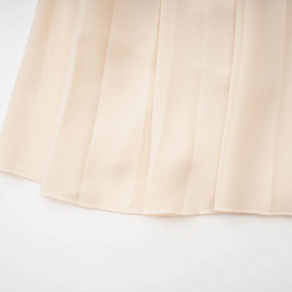 Madalynn Sleeveless Mock Neck Pleated Knitted Midi Dress