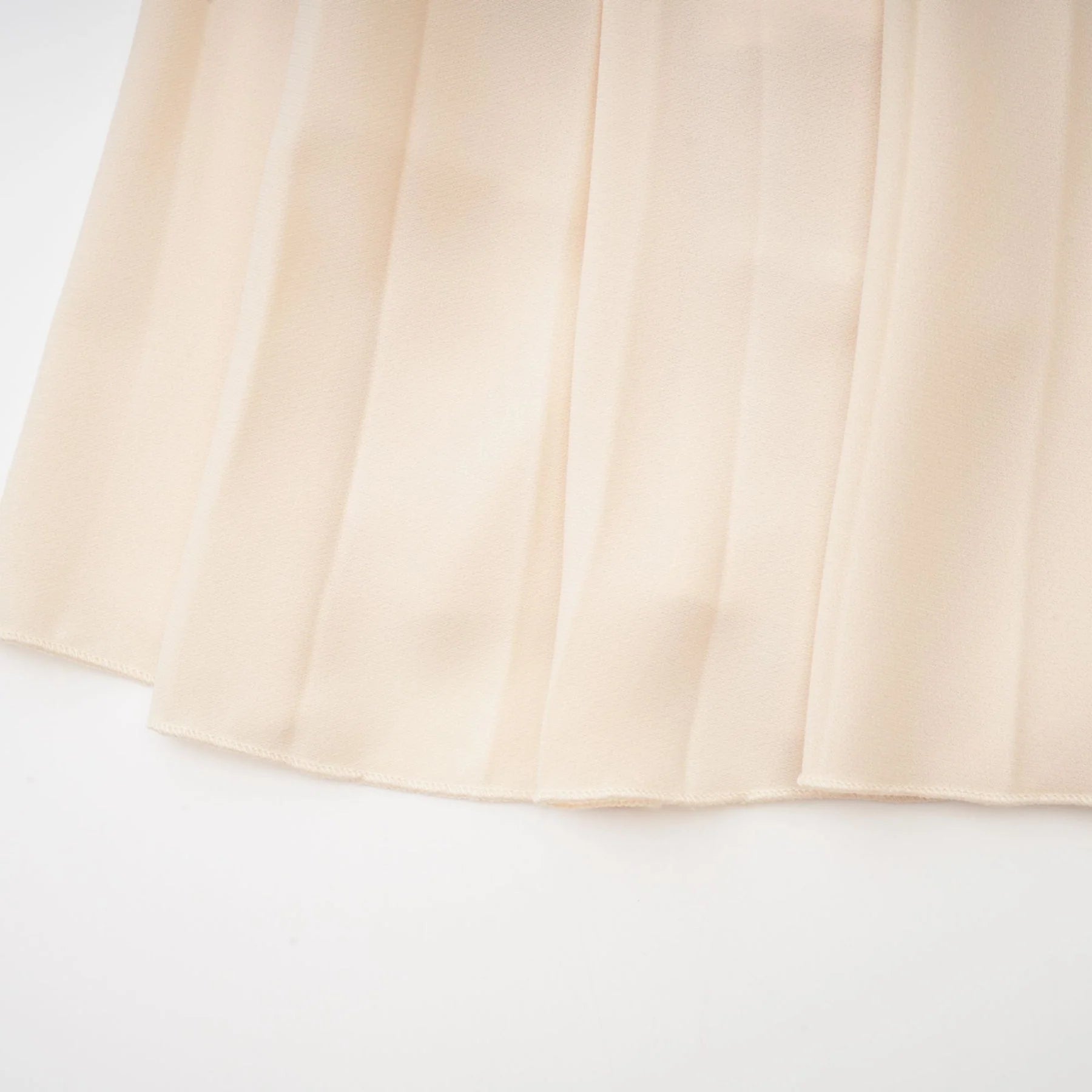 Madalynn Sleeveless Mock Neck Pleated Knitted Midi Dress