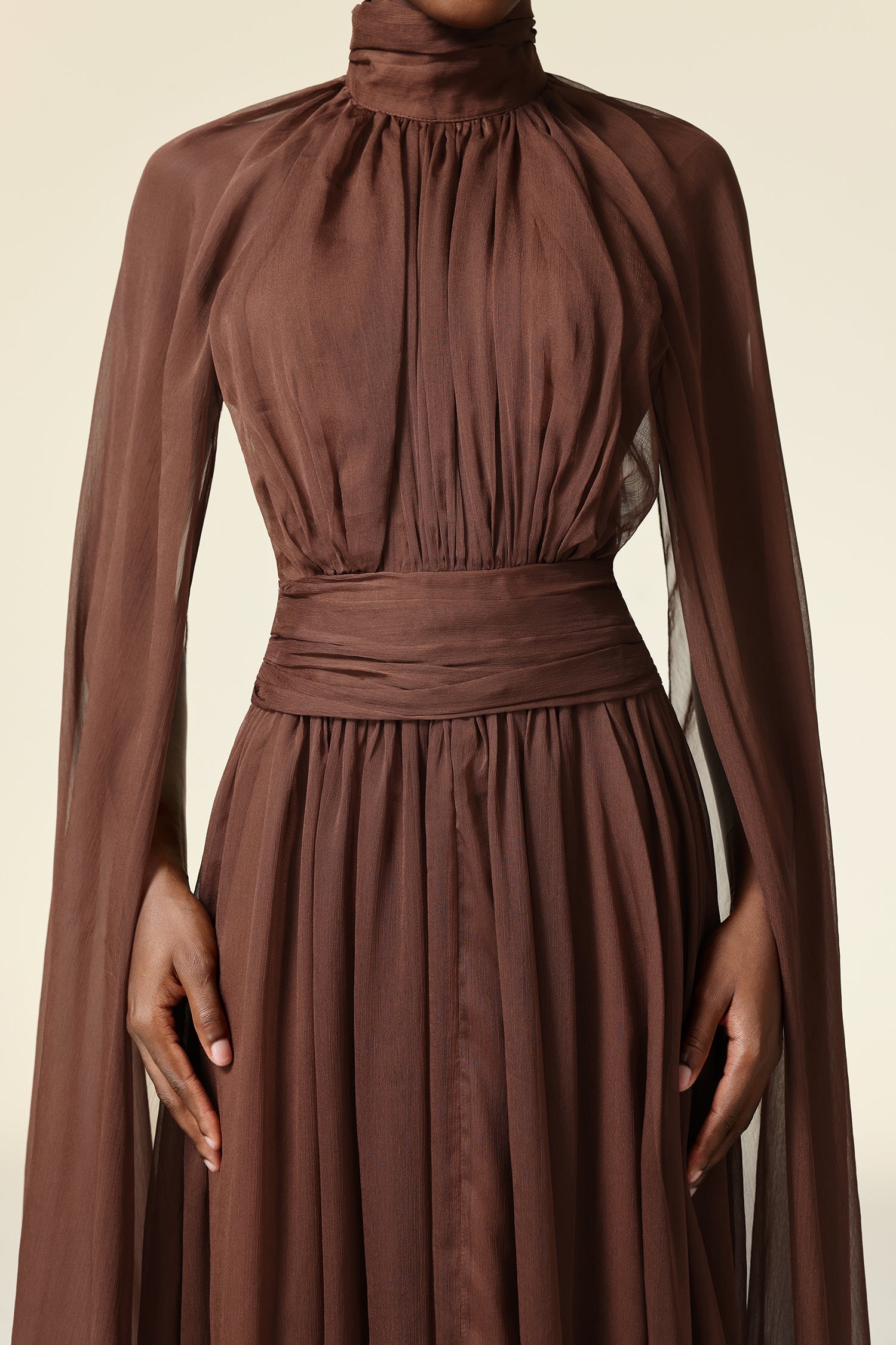 Mariangela Brown Maxi Dress with High Neckline and Intricate Bodice Detailing