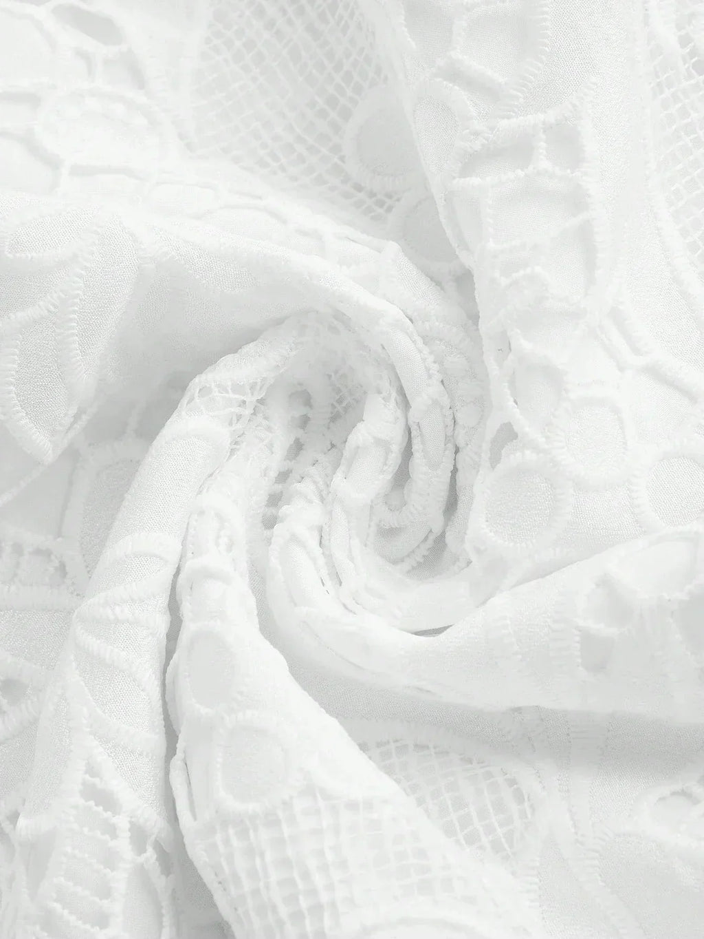 Delicate and ethereal, this white lace dress features intricate floral patterns that cascade gracefully, enhancing its.