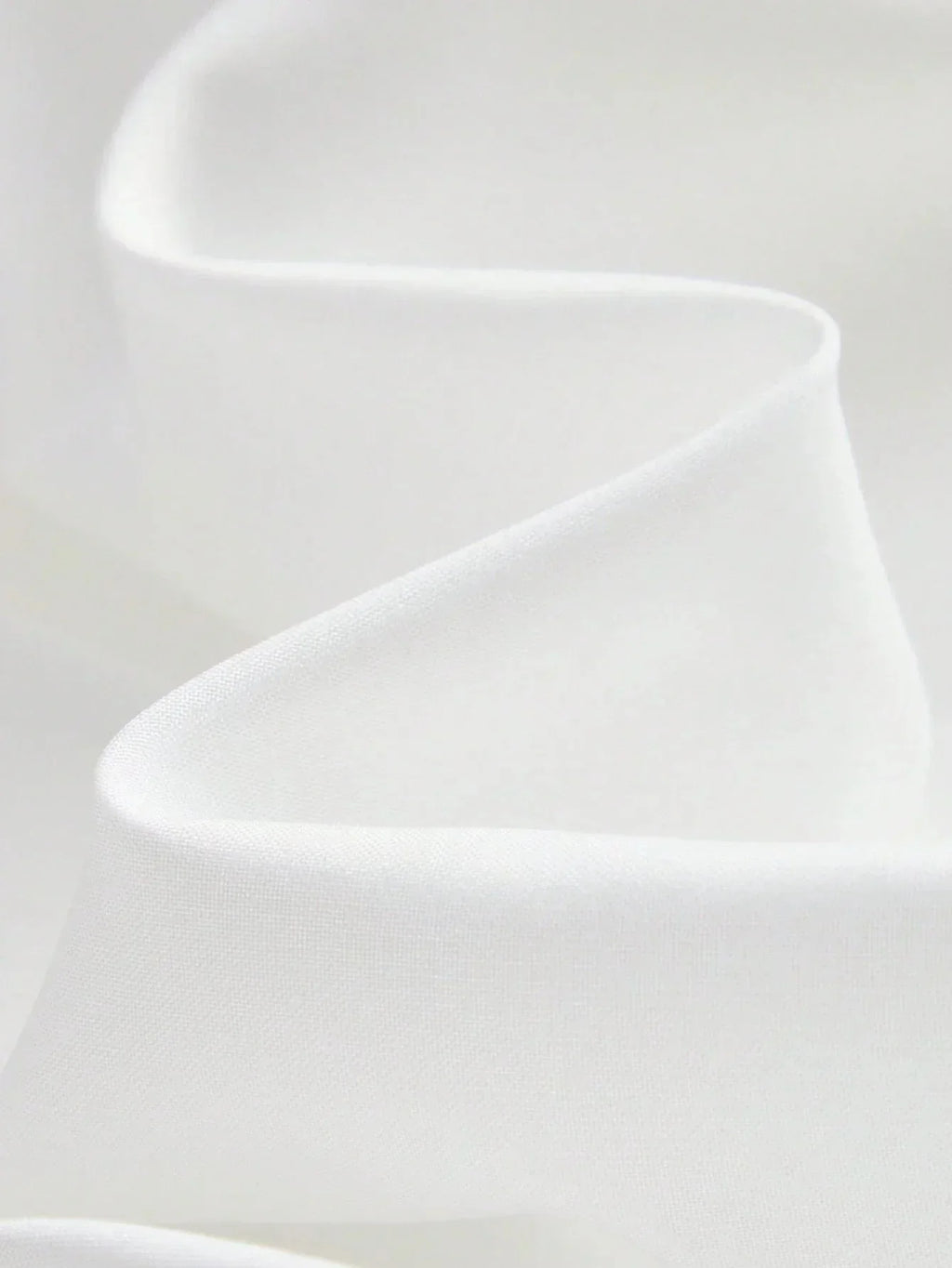 This elegant white dress features a flowing silhouette crafted from soft, lightweight fabric that drapes beautifully. Its.
