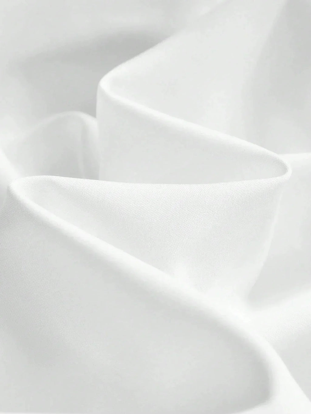 Experience elegance with this flowing white dress, crafted from a soft, lightweight fabric that drapes beautifully for a.