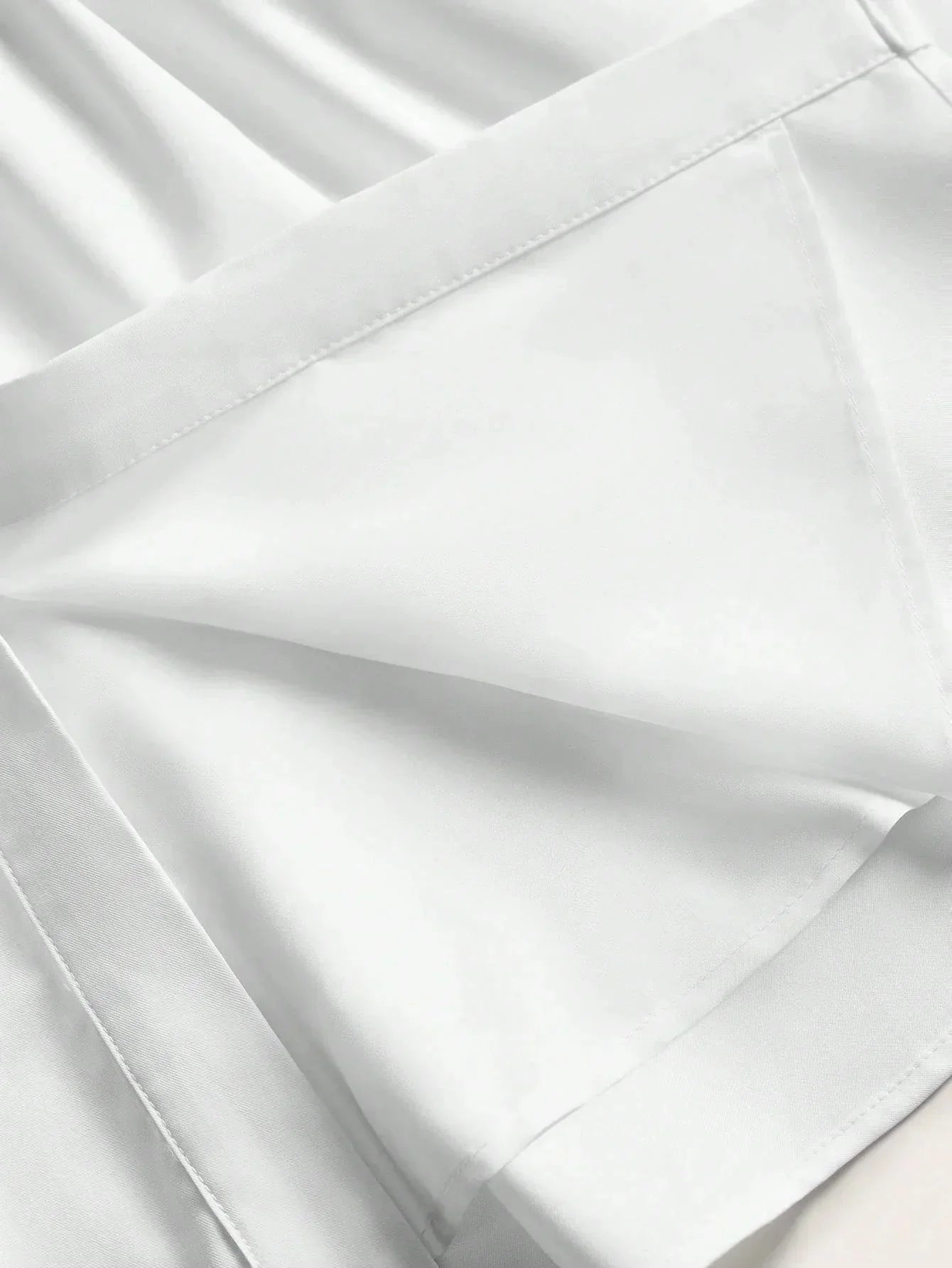Experience elegance with this stunning white dress, featuring a sleek fit and a flowing silhouette. Made from a soft,.