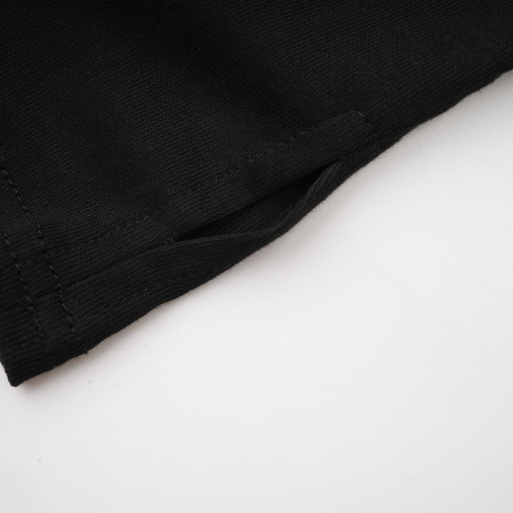 Ofelia Top Black Ruched Halterneck Jersey & Metal Buckle Detail