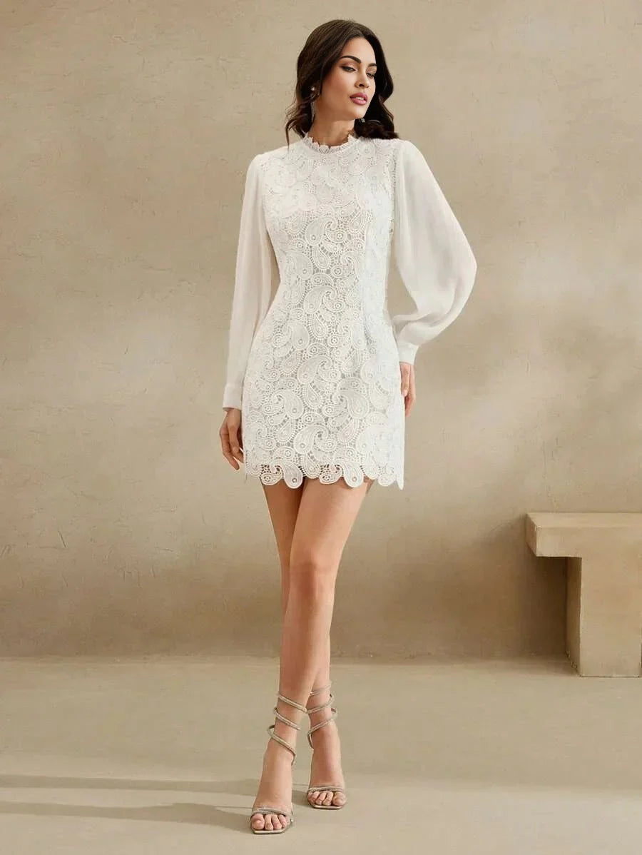 Elevate your style with this stunning white lace dress, featuring a fitted bodice and flowing long sleeves that add a touch.