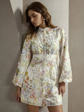 This enchanting floral dress features a delicate, pastel palette with intricate blooms, perfect for any spring occasion. The.