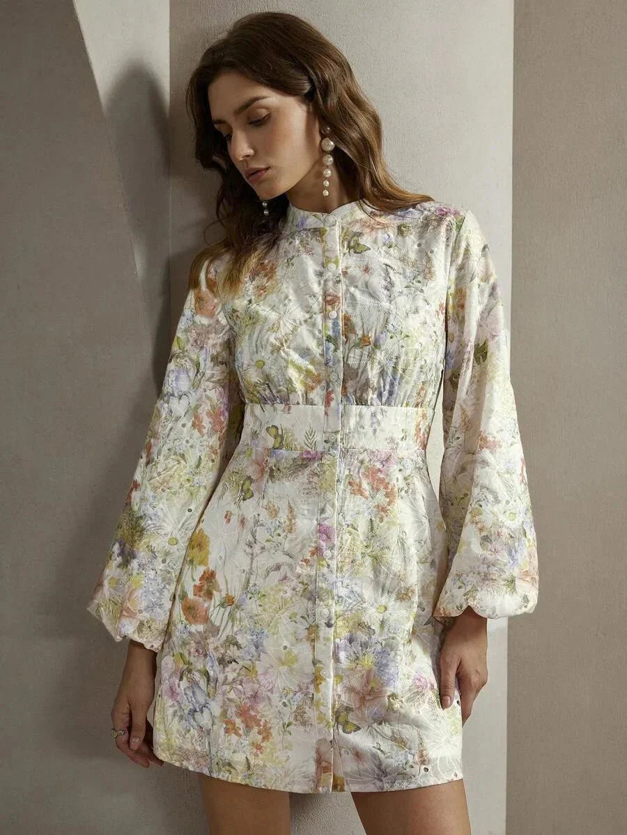 This enchanting floral dress features a delicate, pastel palette with intricate blooms, perfect for any spring occasion. The.