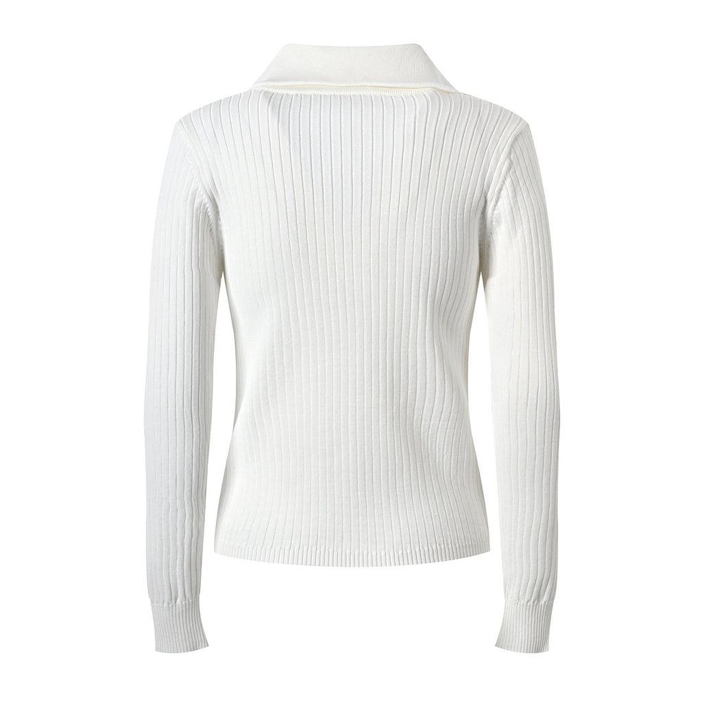 Raven Top – Fitted Ribbed Knit – Collared Design – Gold Button Accents – Decorative Pockets – Tailored Silhouette – Stretch Fabric